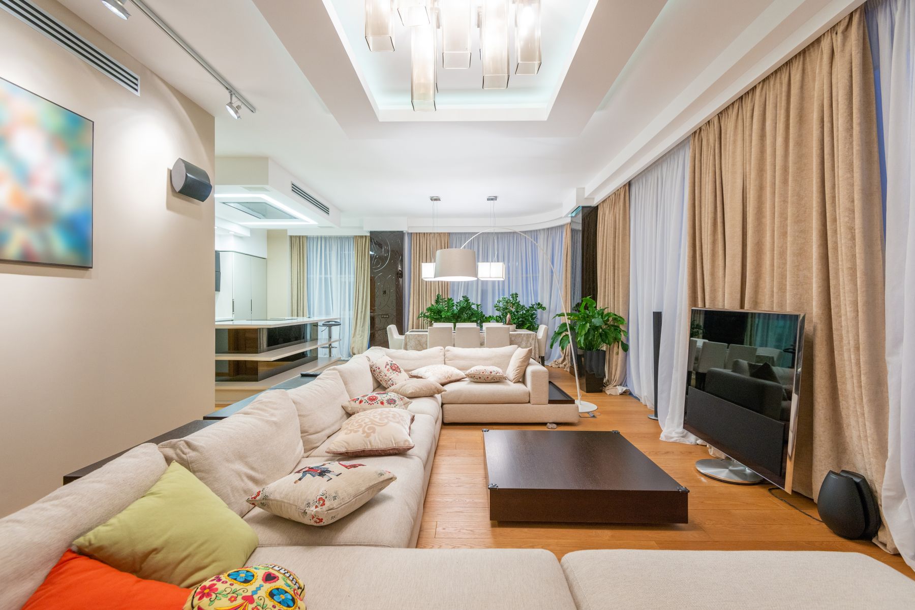 Stylish living room with a comfortable sofa and colourful cushions